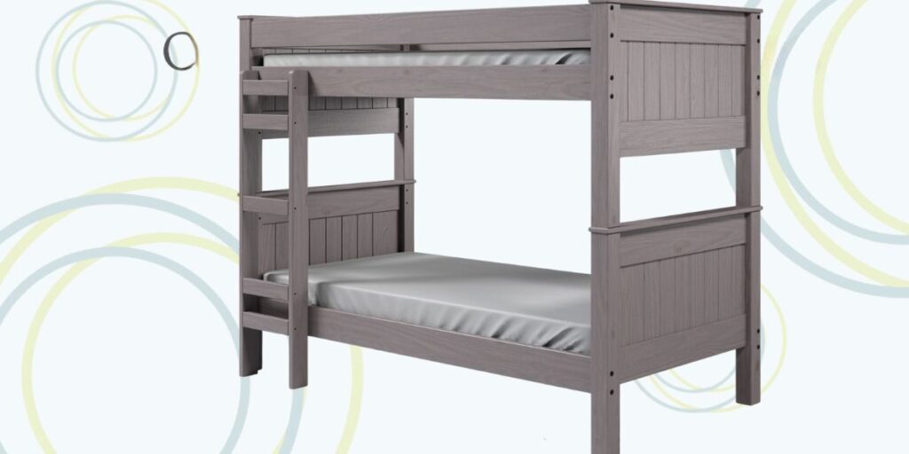 A space-saving 18X Panel End Bunk Bed with ladder and mattress, designed for safety and durability in group living environments.