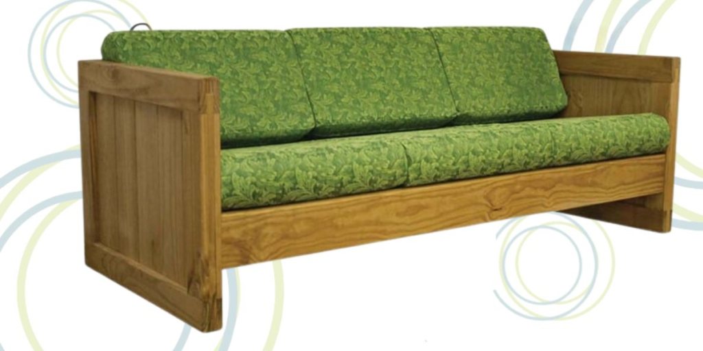 A green couch with a wooden frame and cushion, highlighting the importance of replacing worn-out cushions for comfort.