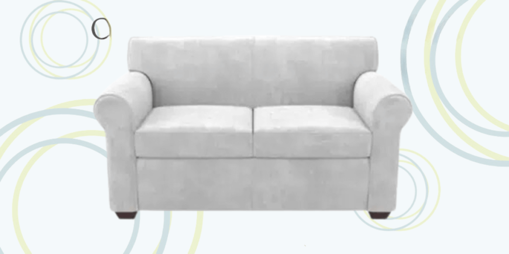 A white couch featuring a circular pattern, designed for comfort and space efficiency in various settings.