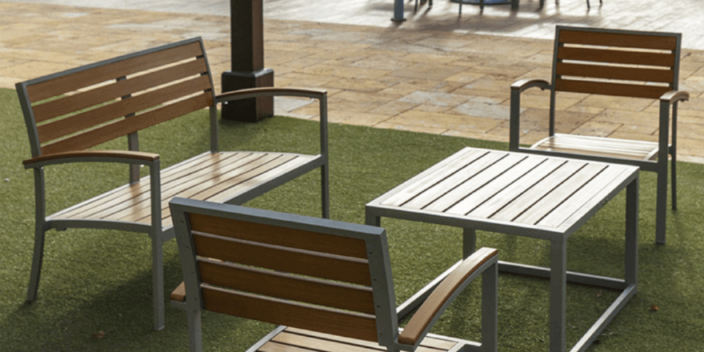 Outdoor furniture featuring wooden slats and sturdy metal frames, ideal for durability and style in various environments.