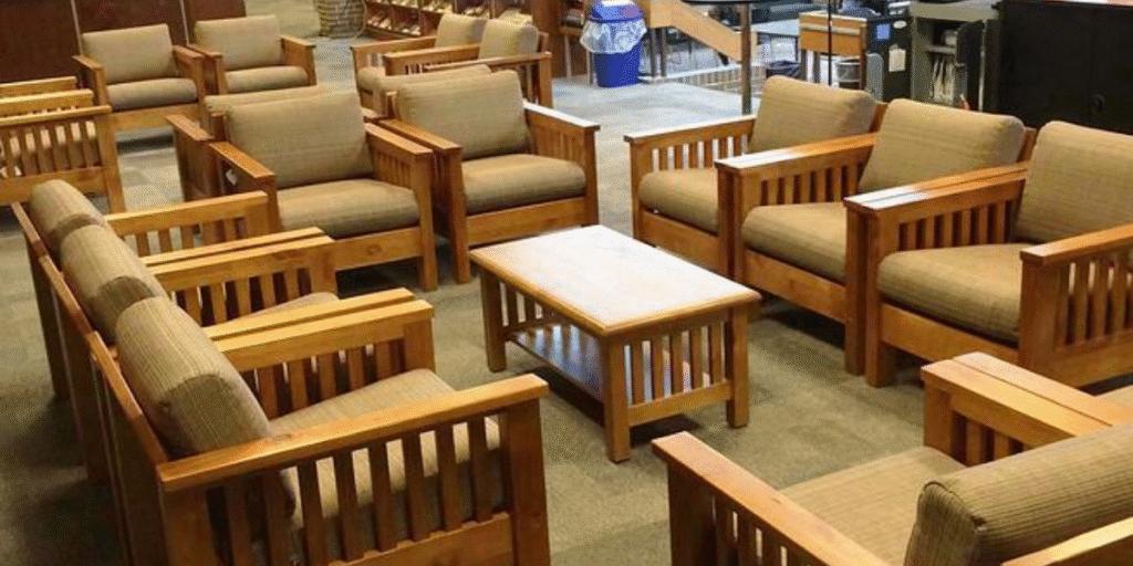 A spacious room filled with chairs and tables, designed to promote calmness in a behavioral health setting.